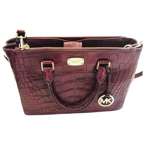 michael kors burgundy wallet|burgundy michael kors bag.